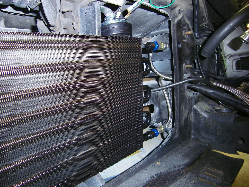 I want to run 304 braided stainless steel transmission cooler lines. They  look nicer than rubber hoses and they stand up to the heat better. Ideally  I would prefer 6AN connections on