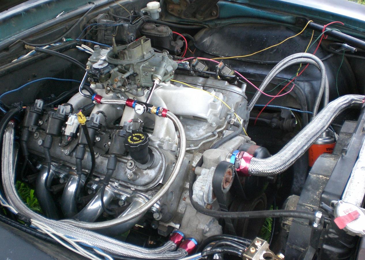 Anyone tried a carb intake and dist on a ls1? LS1TECH Camaro and