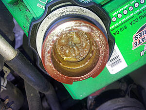 yellow residue/ice under oil cap, ls1-wxylr4s.jpg