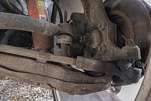 Hard to fix the camber angle because car previously went over curb. Help?-f07ols9l.jpg