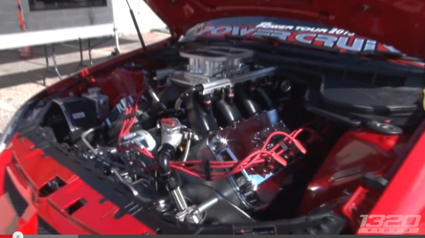 727 cubic inches of fury barely fits in the bay of this Holden HSV.