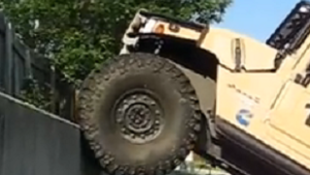 Say What? Watch a Humvee Climb a Six-Foot Wall (Video)