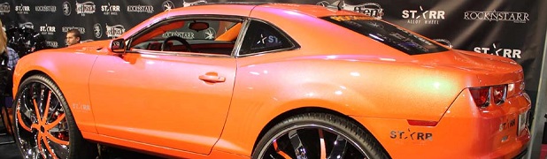 Sorry, the “First Car in the World on 34-Inch Wheels” is a Camaro