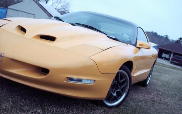 RIDE ON! A Yellow 1995 Pontiac Firebird