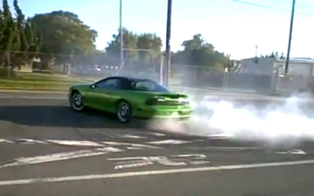 Green Fourth Gen Camaro Spins Hard Donuts in Street Takeover