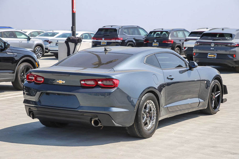 four cylinder Camaro with weld beadlock wheels rear 3/4