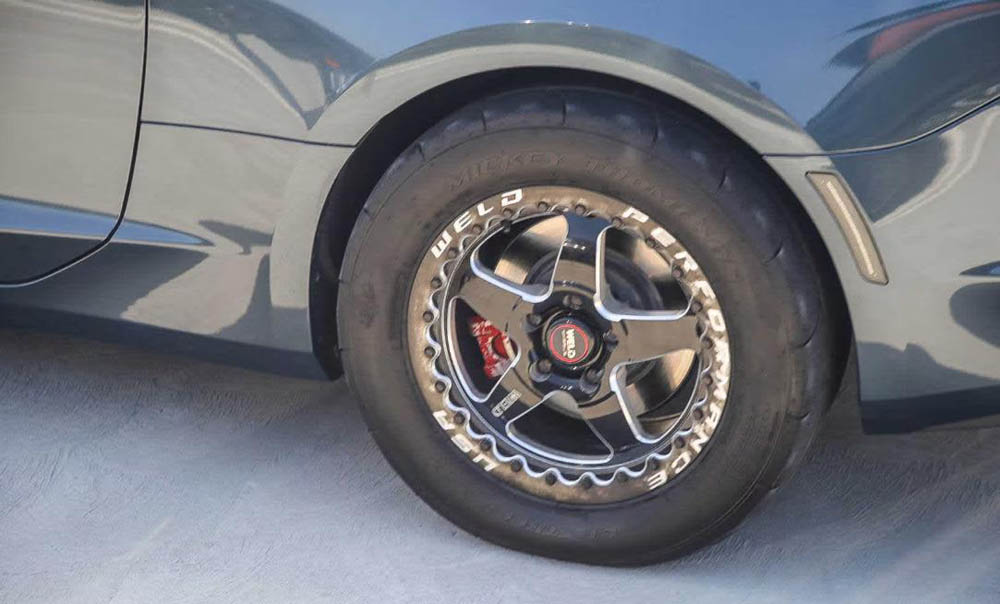 four cylinder Camaro with weld beadlock wheels rear wheel closeup